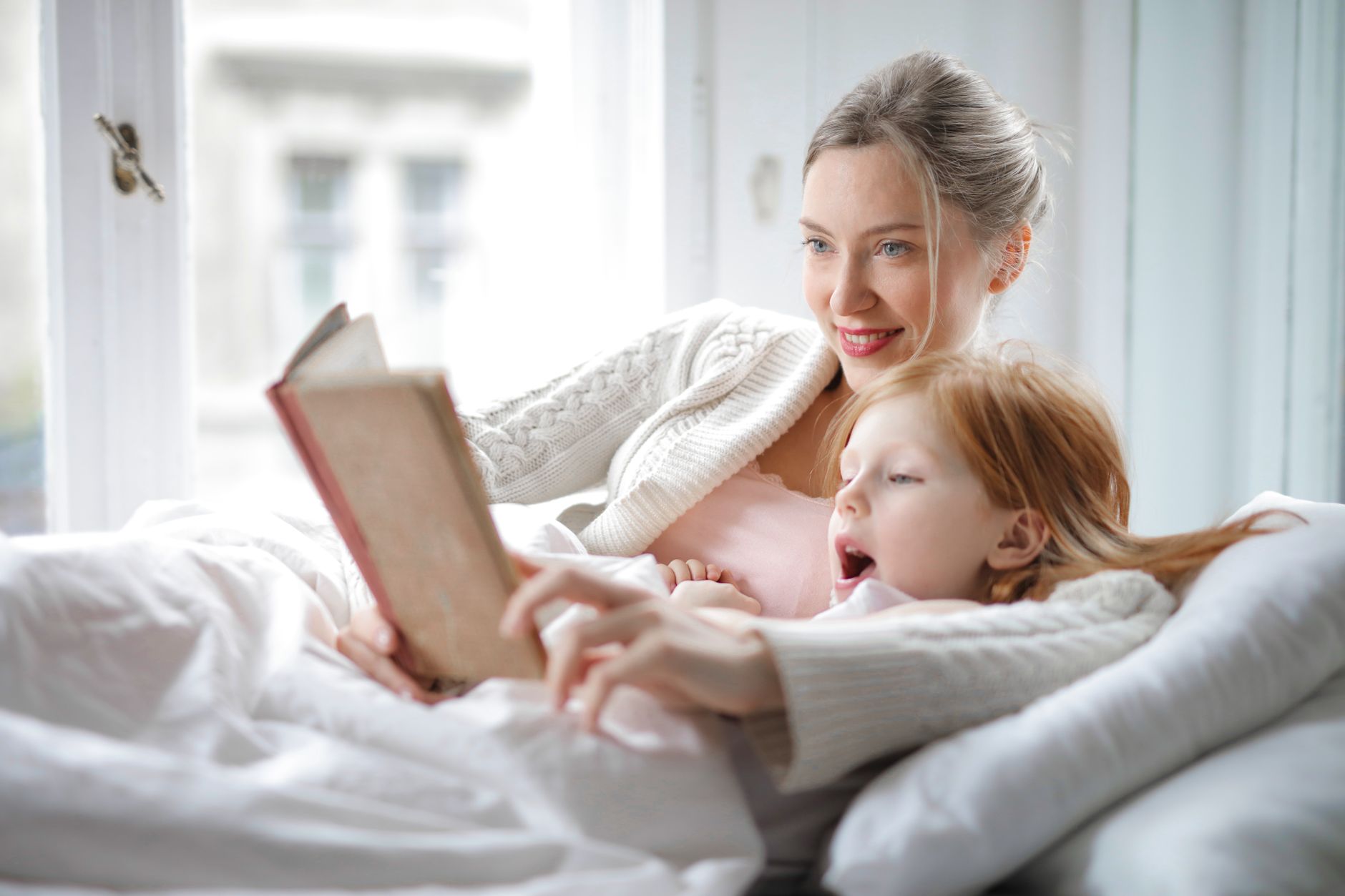 Mother reading with child